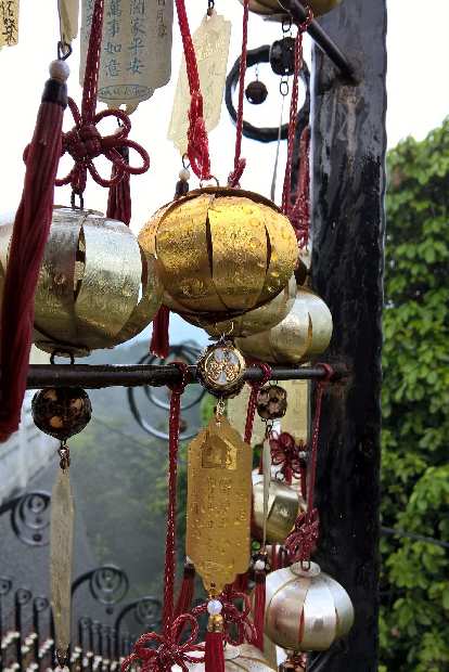 Ornamental bells dangling off a fence north of Sun Moon Lake in Yuchi Township, Taiwan.