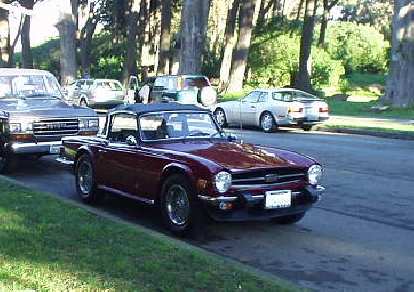 It seems like at each of the last short races I have done, there have been cool vintage sports cars driven by runners.  Here's a purty Triumph TR6...