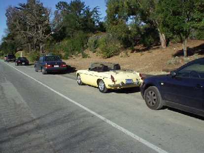 Speaking of sports cars, here's Goldie, back in the land we used to roam (Portola Valley) back in our Stanford days. You can sort of see Adrian's black Z3 in there too. Can't wait 'til our next hike!
