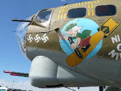 Photo: Front detail of the B-17 had swastikas and a Popeye-like character on it.