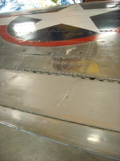 Several WWI-era planes used fabric tape for the wing tips, which was light weight.
