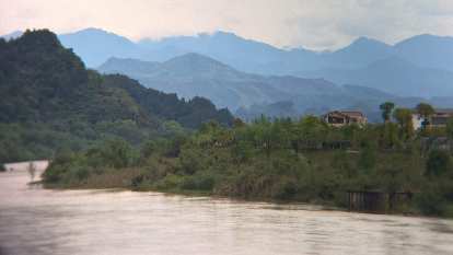 Mountains beyond Chongyang Brook in Wuyishan, China.