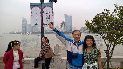 My dad and mom on the island of Gulangyu, with Xiamen in the background.