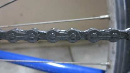 My Gitane's chain after using the Z Chain Oiler, before wiping with a rag.
