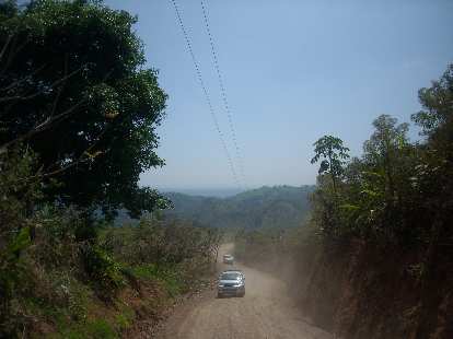 Motoring up a dirt road to the zip-lines. Motoring up a dirt road to the zip-lines.