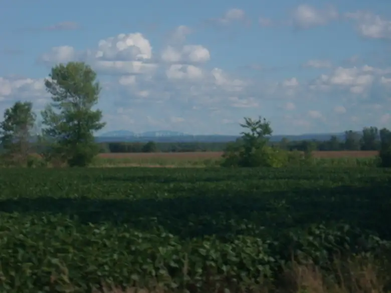 [Mile 379] Beyond the farmland, a windmill farm in Quebec was visible in the distance.