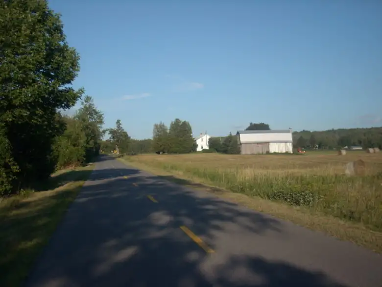 [Mile 392] Riding past more farms in the province of Quebec.
