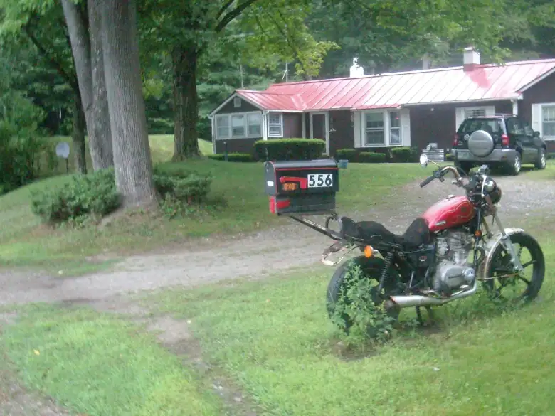 [Mile 657] Nice mailbox stand—a motorcycle—near Winchester, New Hampshire..