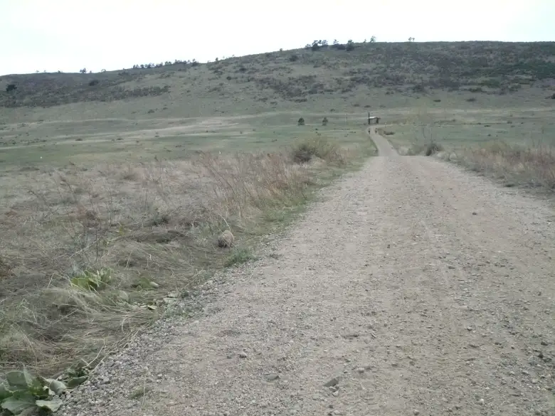 A praire dog looks on as we head towards the ridge.  Can you see him?