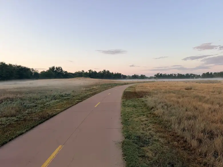 On the Poudre Trail, a light fog hovered over the grasslands.