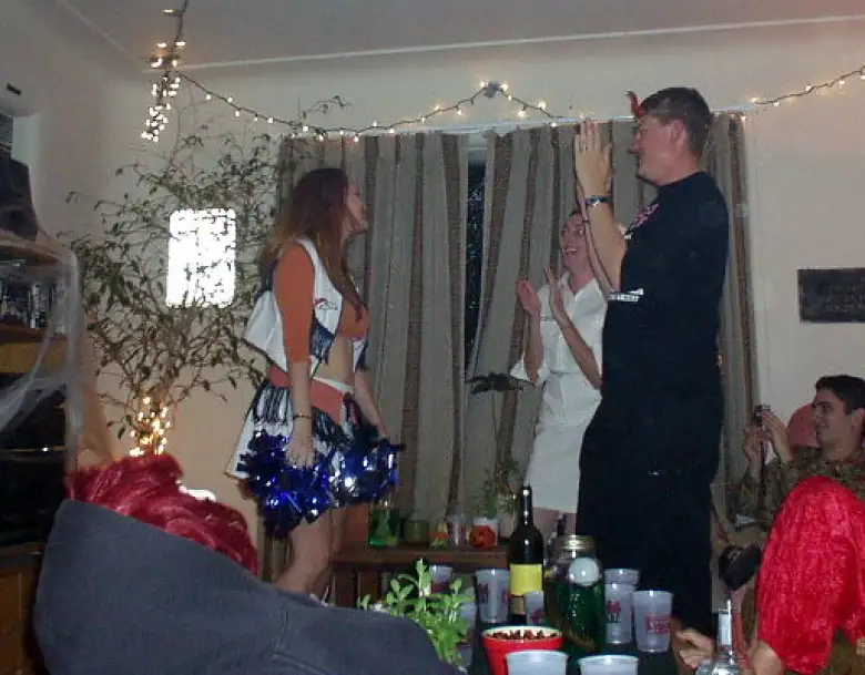Some people doing a well choreographed cheer.