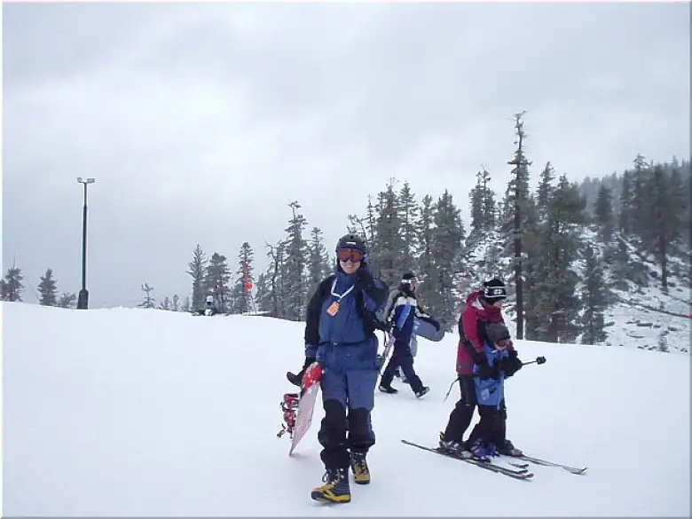 ... and 10 minutes later, there's Carlos!  It is definitely windier and colder up here than below, and the snow is much icier.