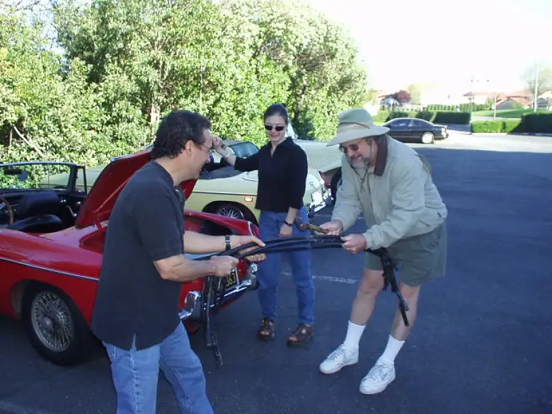 We caravaned over part way with other members of the MG Owner's Club.  Here in the parking lot, it took a couple of people (and a knock-off hammer!) to take apart an MGB's stowaway top.