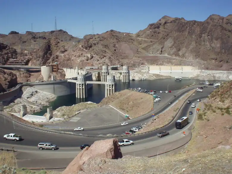 Cars navigate a tight turn around Hoover Dam.