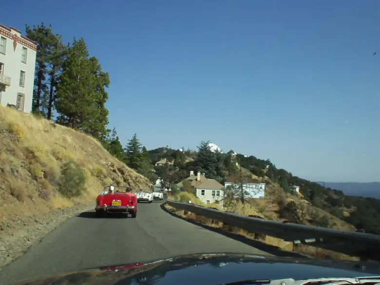 Following Jennifer's red MGA and other MG's down the backside of Hamilton.