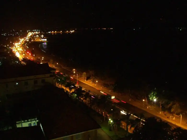 Nighttime view of Nha Trang from the balcony of our room across from the beach. Nighttime view of Nha Trang from the balcony of our room across from the beach.