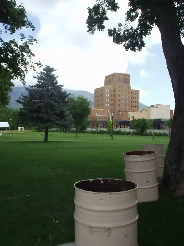 Park, bulding, and the mountains.