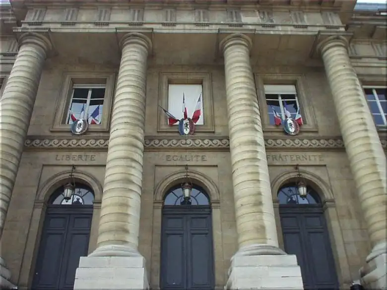 On the Palais de Justice are the inspiring words 