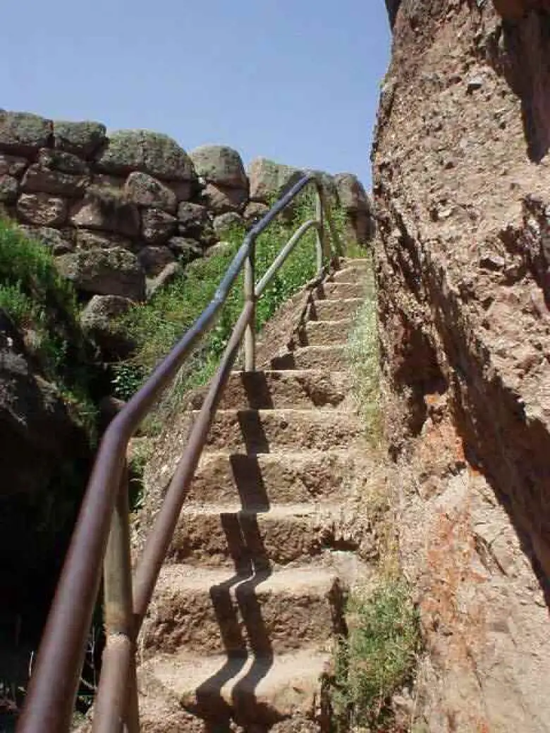 Narrow rock stairwell after a number of cave-like passageways at the Pinnacles.  Watch out for poison oak lining the top of the stairwells!