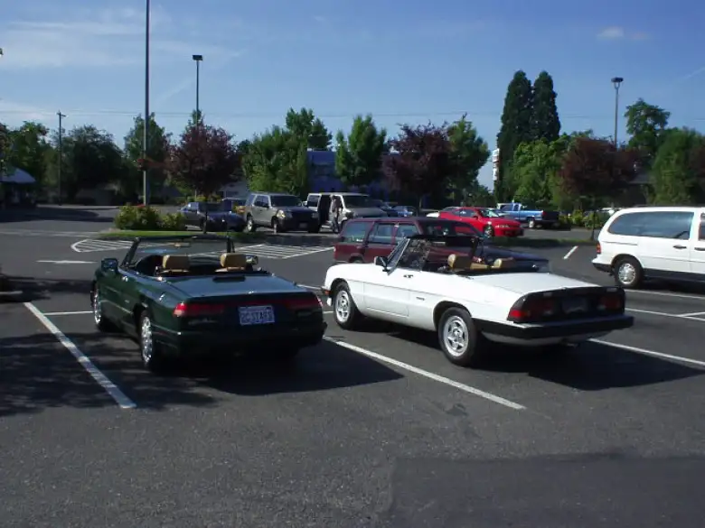 Elaina and a white '90 Spider.  