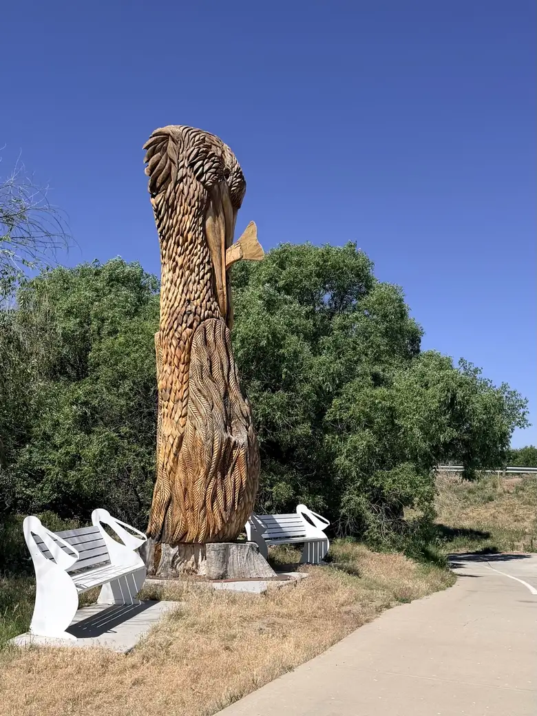 There were a few bird-themed wood sculptures along the Poudre River Trail in Windsor, but this one is the largest. There were a few bird-themed wood sculptures along the Poudre River Trail in Windsor, but this one is the largest.