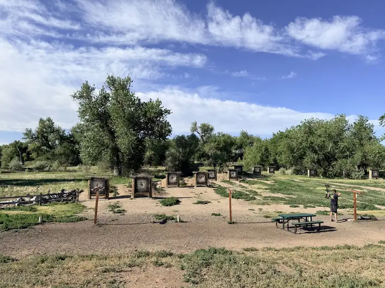 A man was practicing archery at the Windsor Archery Range. A man was practicing archery at the Windsor Archery Range.