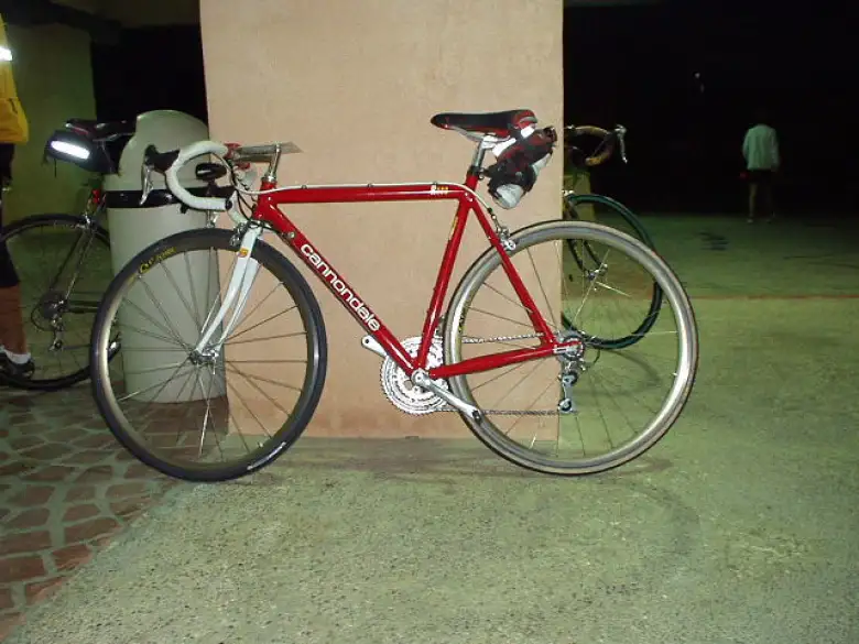From 2000-2002 we experimented with some behind-the-seat water bottles, but would later revert back to white alloy downtube-mounted cages for better handling.  Here at the 2002 Heartbreak Double, we also experimented with Michelin Pro-Race tires (front), with good results.