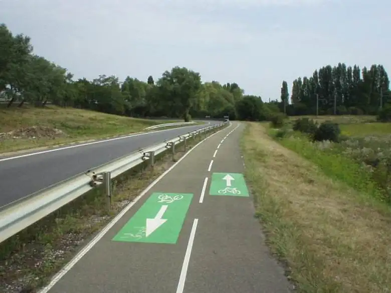 In cities like Versailles, it is not uncommon to encounter well-marked bike trails like these.  Much better than most places in the United States!