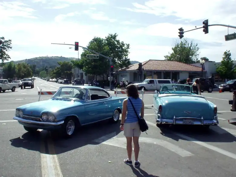 Sharon looking at a 60s Capri that I could not get a photo of at last year's 2004 West Coast Kustoms.