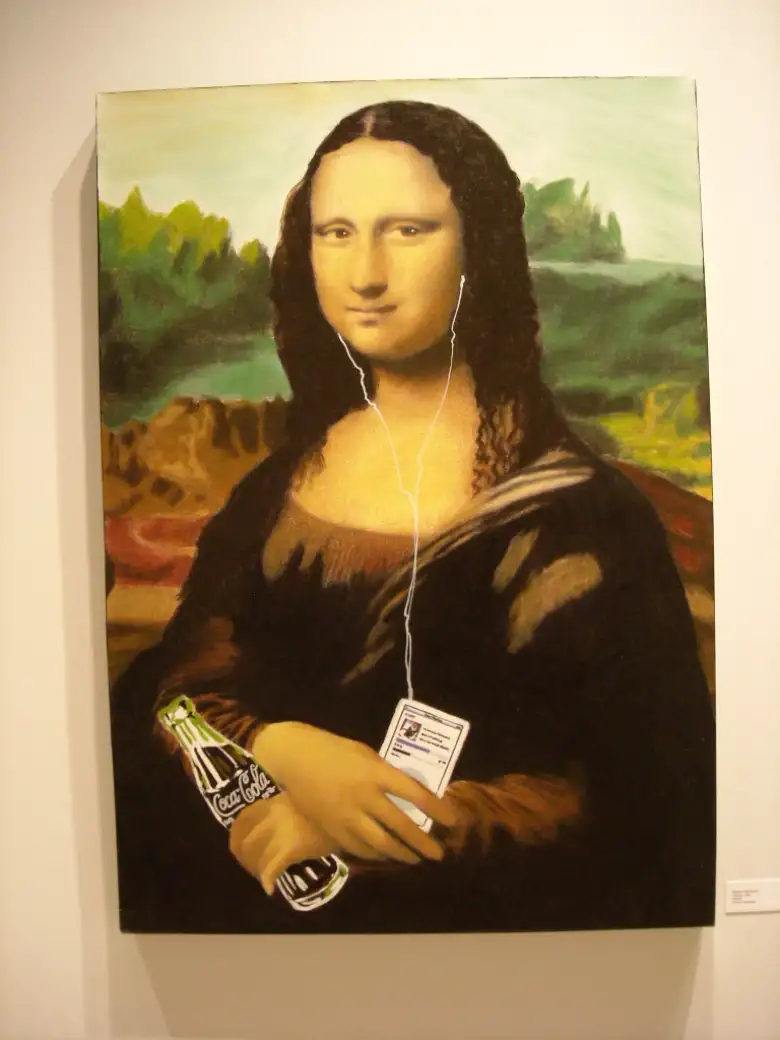 Mona Lisa holding an iPod and a Coca-Cola. Mona Lisa holding an iPod and a Coca-Cola.