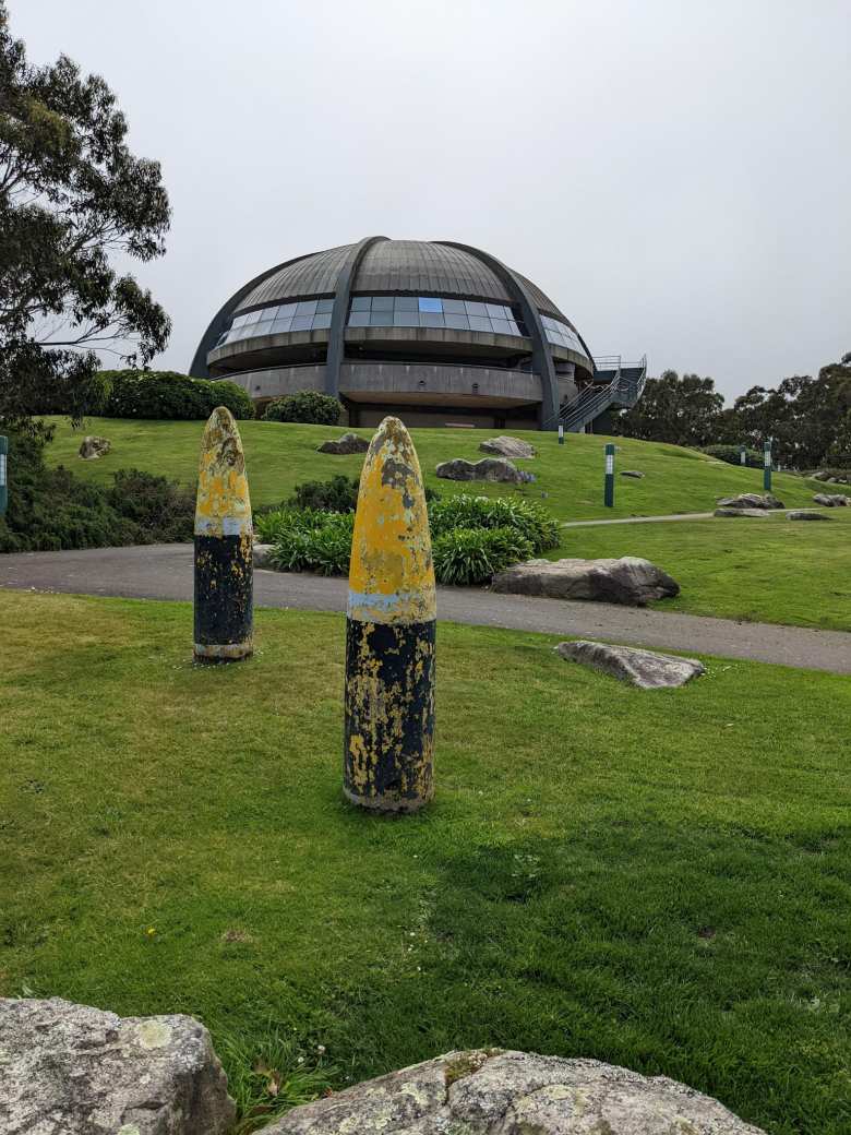 World War II projectiles in front of an observatory at Monte de San Pedro.