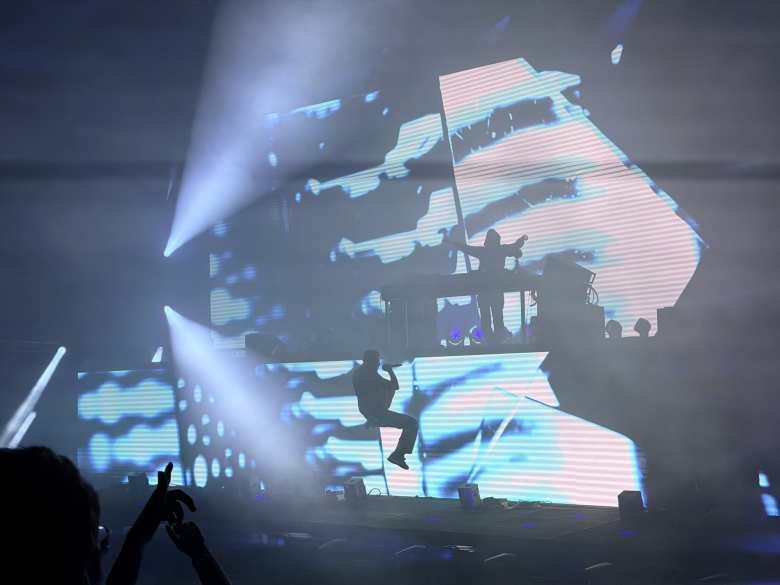 Robin Packalen doing a mid-song spin. He had done a backflip earlier.