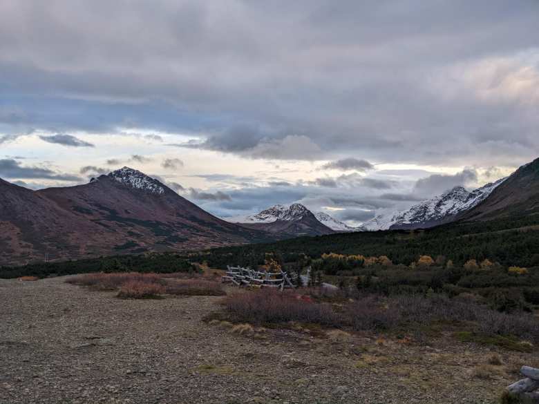 The view towards snow-capped mountains from Flattop Mountain in Anchorage, Alaska.