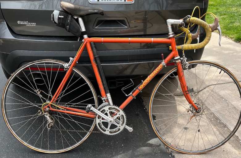 Chris Kirkland’s 1973 Colnago, featuring bolt-on brake cable housing clips mounted on the bottle cage. The high-flange hubs reflect the style commonly imported into the U.S. during the early 1970s.
