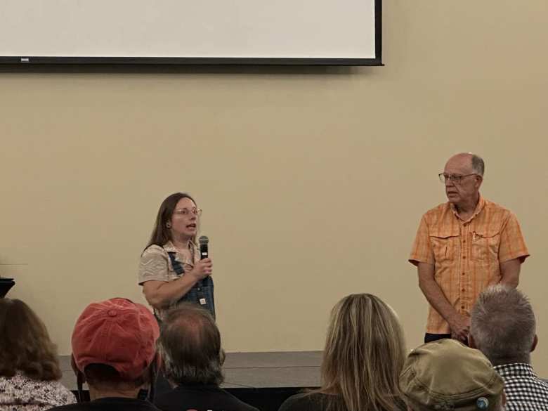 Julia Wildman, Grand Valley Streets Alliance board member, addresses the crowd.
