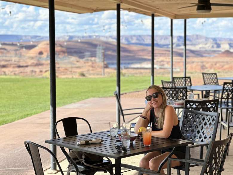 Andrea on the outside patio of Sunset 89, which has nice views of the Colorado River.