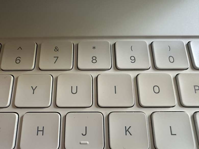 The touched-up 'I' key.