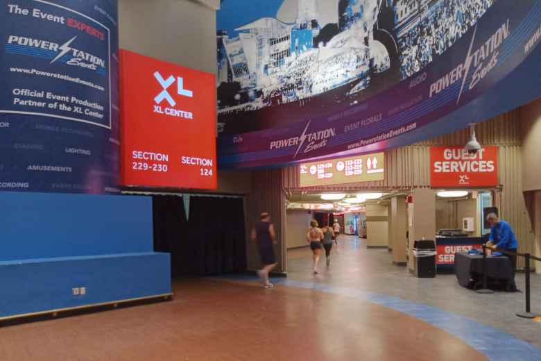 Runners running a 5k inside the XL Center in Hartford Connecticut before the 2020 Arena Attack Indoor Marathon.