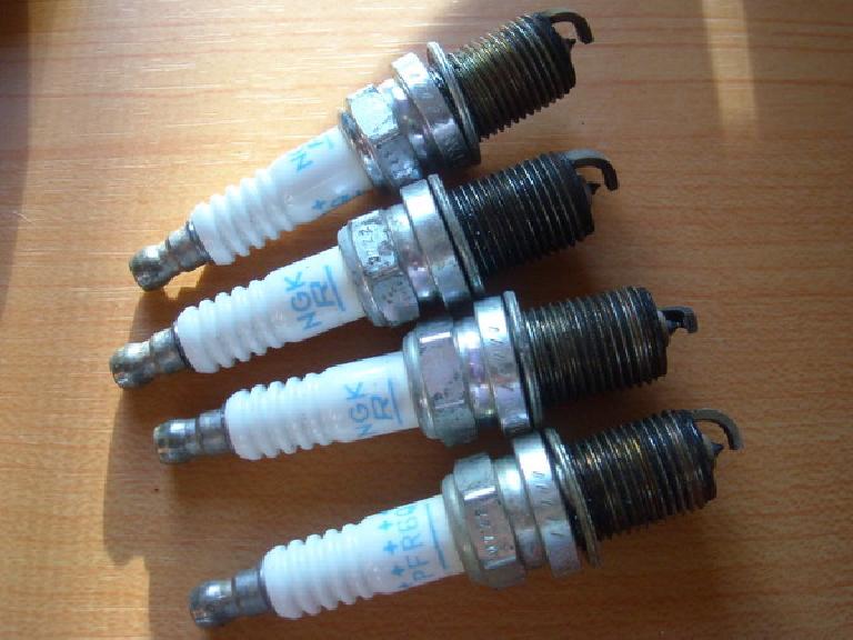 When I pulled the NGK spark plugs from the Audi TT Quattro as part of its 80,000-mile service, the insulators and electrodes looked remarkably clean.
