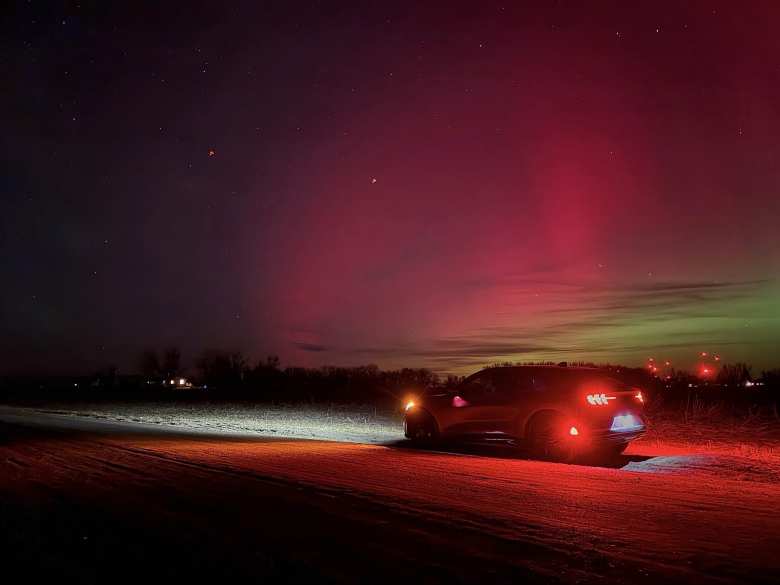 The aurora over a county road in north Fort Collins.