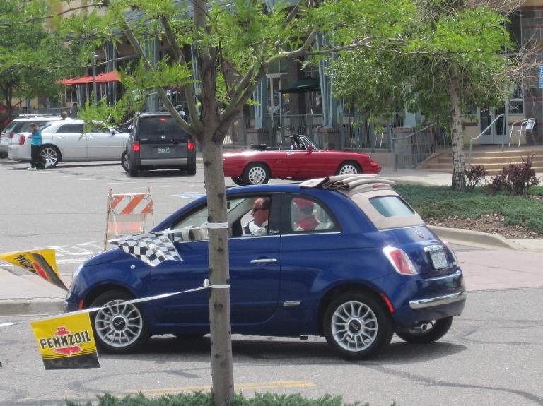 Fiat 500 Cabrio, the first one I've seen in the flesh.  Note the retracting old-school soft top.