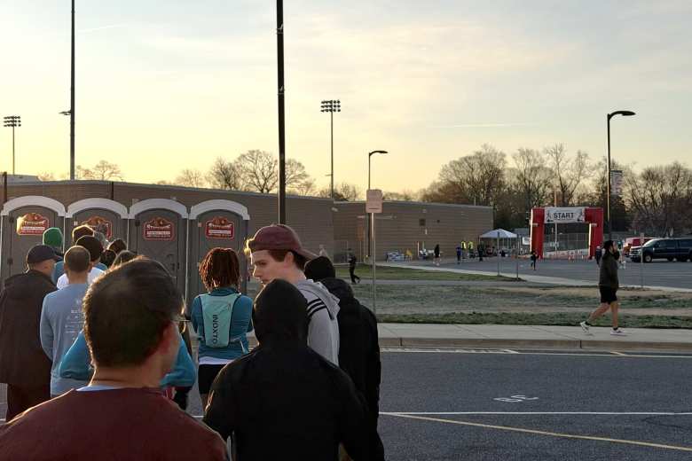 The queue for the portable toilets and the Start/Finish line of the B&A Trail Marathon and Half Marathon.