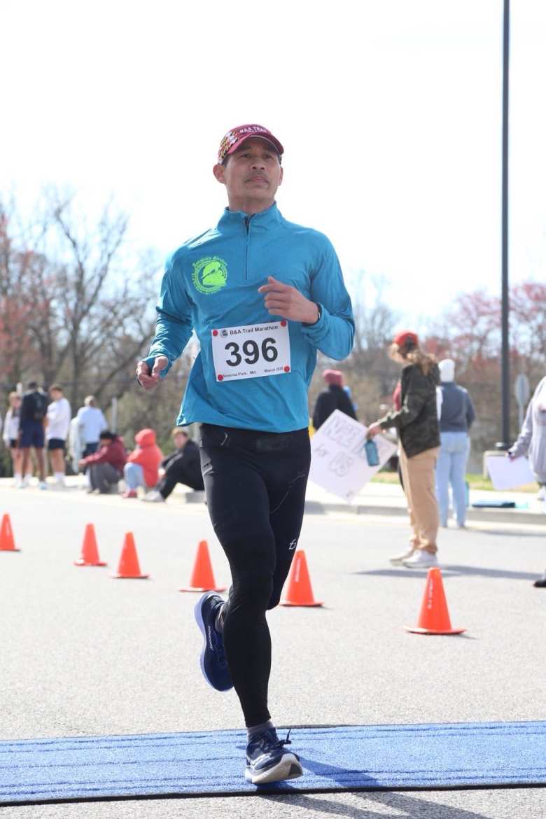 Felix Wong crossing the finish line of the B&A Marathon in 3:25:21.