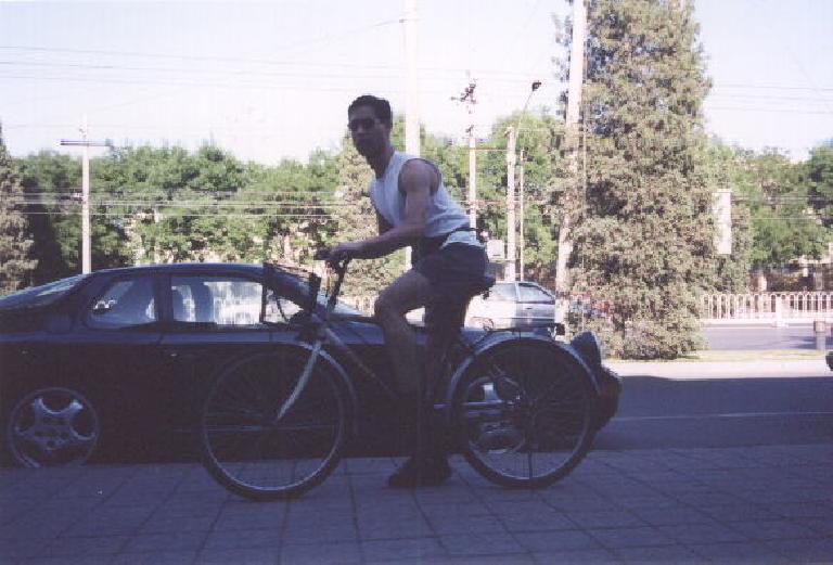 That's me.  I snapped this picture since the Porsche 968 in the background was literally the only 2-door car I saw in all of China!