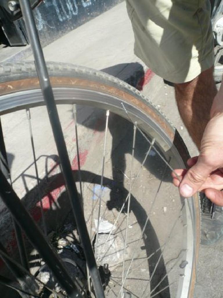 In Chimaltenango, we notice my bike had broken a rear spoke -- probably early on during the ride on the cobblestones of Itzapa.
