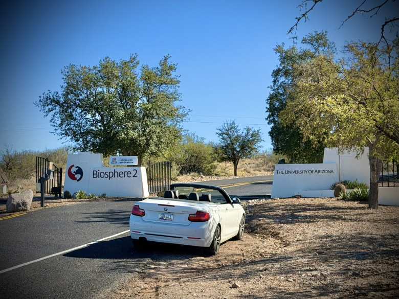 Arriving at Biosphere 2 in a BMW 228i Convertible, a rental car from Turo.