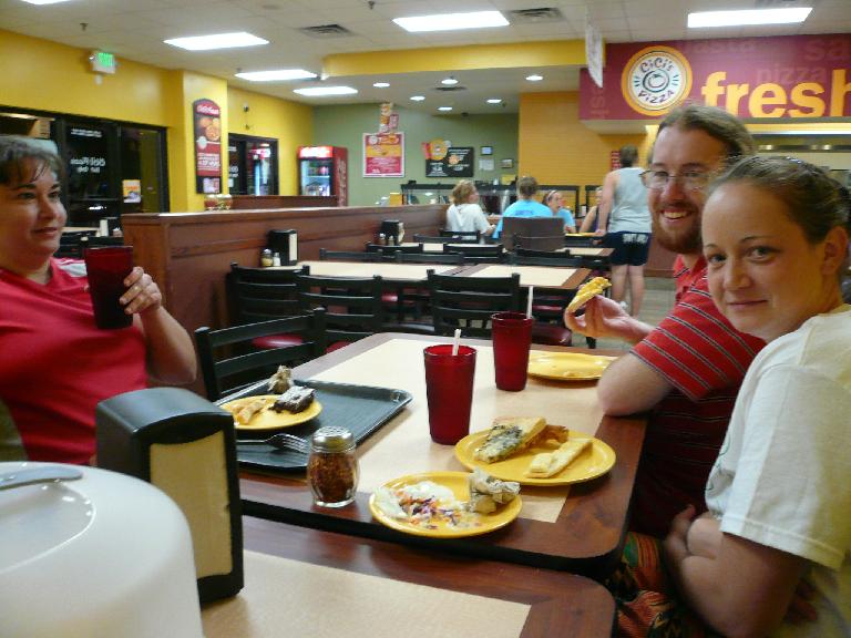 Christy, Jesse, and Ryan having some special-order pizza.