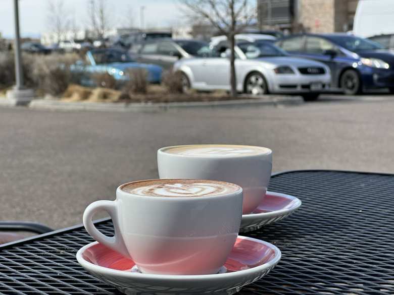 We started the day with café lattes outside Harbinger Coffee in south Fort Collins. My silver Audi TT Roadster and Manuel's crystal blue metallic Mazda Miata can be seen in the background.