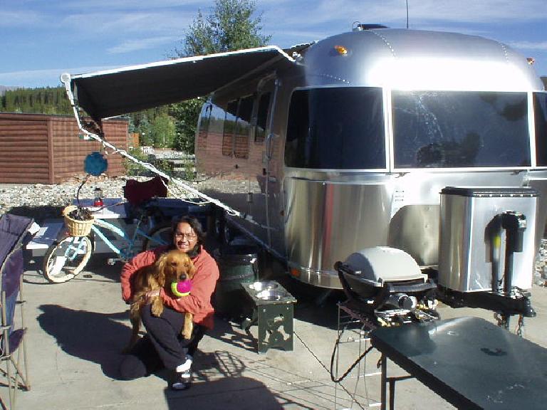Mike and Kenzie with their Airstreamer at the RV park they are temporarily staying at.