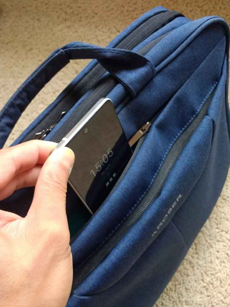 The Kroser laptop bag has a convenient top pocket specifically designed to quickly stash your cell phone and wallet into when you pass through airport security.